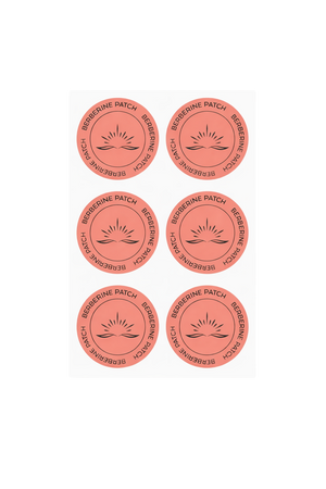 Six red circular wellness patches with a central design on a white background